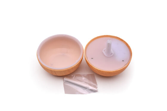 Difusor de diseño minimalista con acabado de grano de madera y base antideslizante