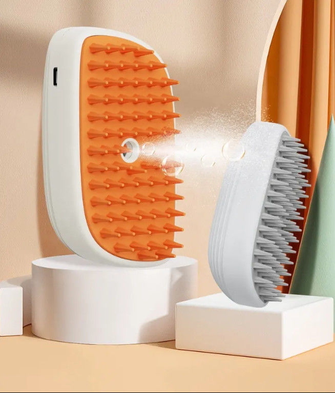 Fabrica mayorista 3 en 1 cepillado de vapor para masajes de mascotas limpieza de agua spray de venta caliente de depilación de gato cepillado de vapor con lig